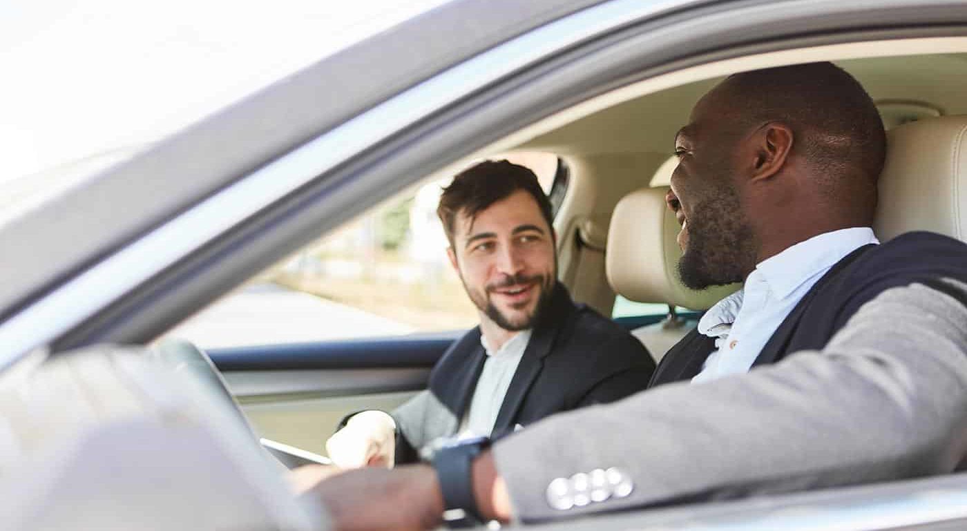 Business people in the car as a carpool