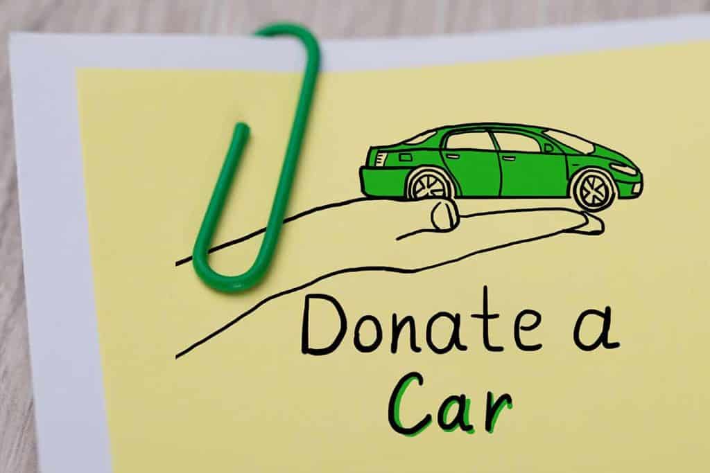 Concept Of Car Donation On Note Paper